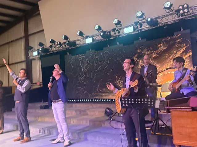 Musicians and platform leaders during an ARISE camp worship service.